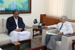 Azad Jammu and Kashmir Prime Minister Chaudhry Anwar ul Haq meeting with Acting Planning Minister Sami Saeed