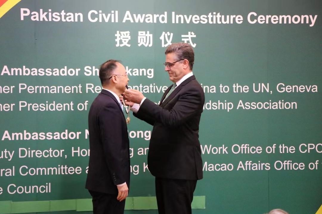 In a dignified investiture ceremony held at Pakistan Embassy in Beijing, Ambassador Khalil Hashmi on Wednesday conferred the prestigious ‘Hilal-e-Quaid-i-Azam’ award, upon two distinguished Chinese dignitaries on behalf of the president of Pakistan. The honorees were Ambassador Sha Zukang, former Permanent Representative of China to the United Nations in Geneva and past President of the China-Pakistan Friendship Association, and Ambassador Nong Rong, Deputy Director of the Hong Kong and Macao Affairs Office of the State Council and former Ambassador of China to Pakistan. - Advertisement - Ambassador Hashmi in his remarks extended heartfelt congratulations and paid a rich tribute to the contributions made by the two dignitaries. He highlighted the significant impact of their efforts on bilateral relations and beyond. Ambassador Hashmi also recalled the salience of time-tested, all-weather friendship between China and Pakistan, describing it as a model of inter-state relations based on mutual respect, strategic trust, and a shared vision for global peace and development. Both Ambassador Sha Zukang and Ambassador Nong Rong expressed gratitude to the president of Pakistan for the honor and reaffirmed their commitment to even further advancing the China-Pakistan relationship. They acknowledged that brotherly ties between China and Pakistan had been a consistent guiding force in their work and stressed that the award was not just a recognition of their personal efforts but also an acknowledgement of collective contributions involving numerous highly dedicated individuals from both sides. The event was attended by a large number of dignitaries, senior government officials and members of the Chinese State media. The Pakistan Times #pakistantimes 