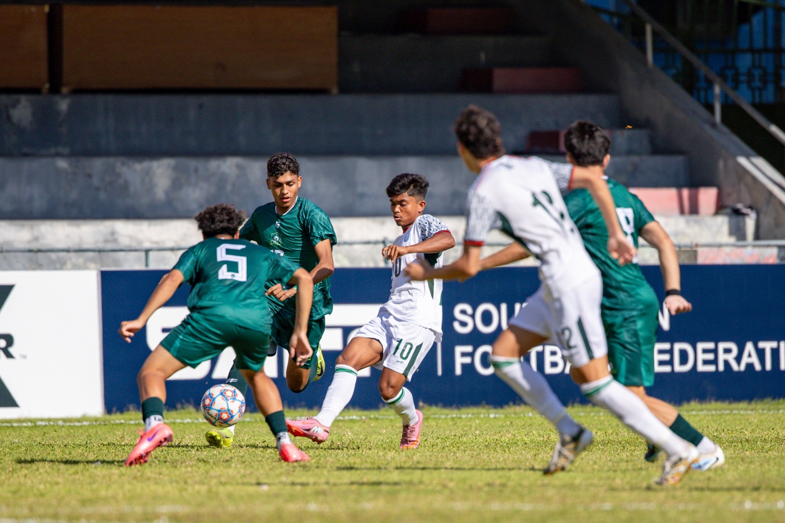 Brave Pakistan fall to Bangladesh in SAFF Under-20 opener The Pakistan men’s under-20 team gave everything in a valiant first half, only to be denied by the officials and then undone by misfortune as Bangladesh sealed a 2-0 victory that did not fully tell the story of this contest. Pakistan had matched Bangladesh stride for stride for long periods of this SAFF U-20 Championship Group ‘B’ encounter, competed with intensity and belief, and thought briefly that they had forced their way back into the game, only to have the moment snatched away. Bangladesh took the lead courtesy of a freekick by debutant Ronan Benjamin Sullivan in the 50th minute. Pakistan believed they had equalised in the 60th minute through Najeebullah’s header, only for the referee to rule out the goal. Seven minutes later, Sullivan sealed the win for Bangladesh with a smart finish in a result that flattered Bangladesh and offered Pakistan precious little consolation. Pakistan will play India next in a must-win game on the 26th and hope for India to defeat Bangladesh in order to have any hopes of qualifying for the semis. The pakistan times